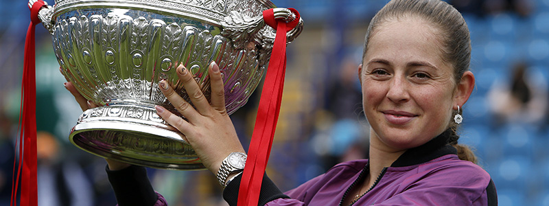 Jelena Ostapenko women's champion holding the 2021 Eastbourne trophy