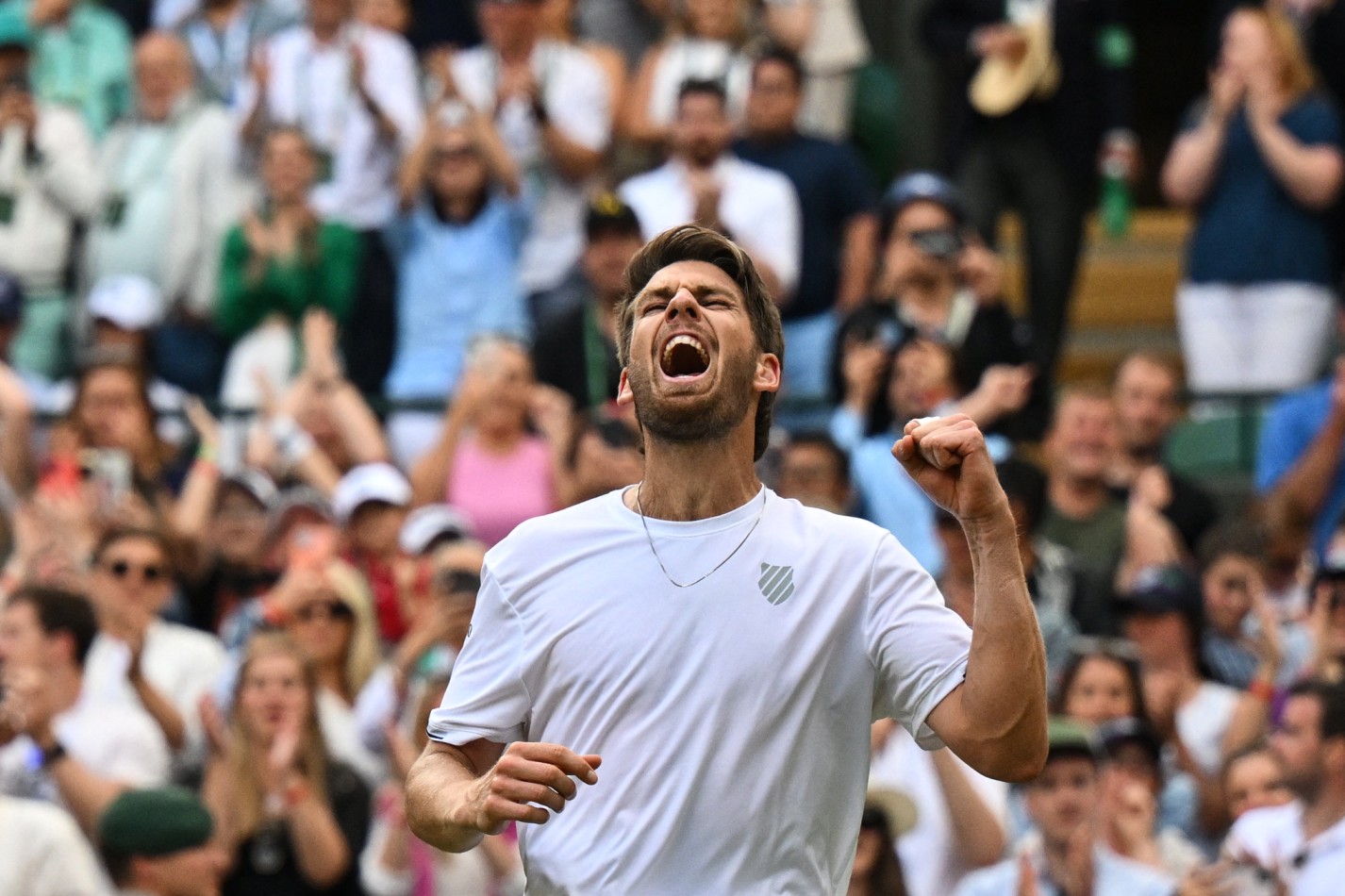 Cam Norrie cheers his fourth round win at Wimbledon