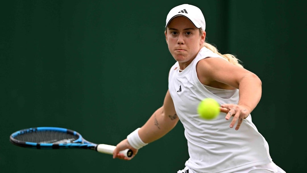 Sonay Kartal preparing to hit a forehand on court at Wimbledon during the first round