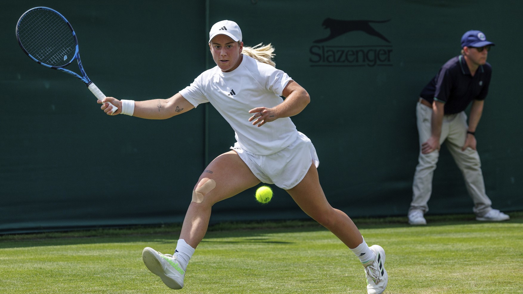 Sonay Kartal (GBR) playing against Suzan Lamens (NED) in the first round of the Ladies’ Singles Qualifying Competition at the Wimbledon Qualifying and Community Sports Centre, Roehampton. The Championships 2024. Day -6 Tuesday 25/06/2024. 