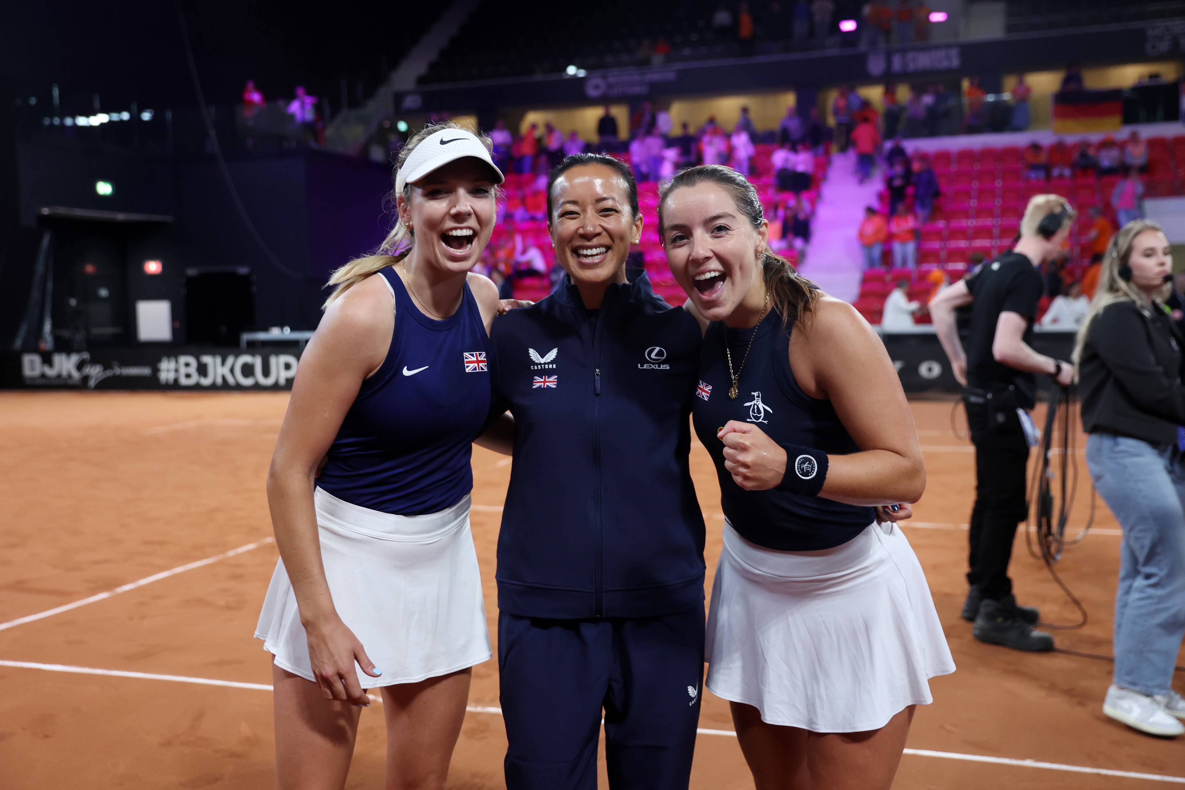 Katie Boulter, Anne Keothavong and Jodie Burrage all smiling after GB defeated Netherlands at the Billie Jean King Cup