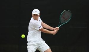Jack Pinnington Jones about to hit the ball with a backhand