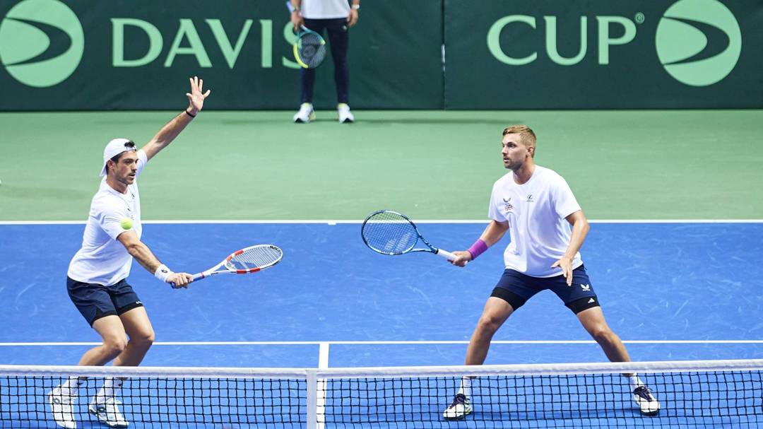 Julian Cash and Lloyd Glasspool at the net during Davis Cup training