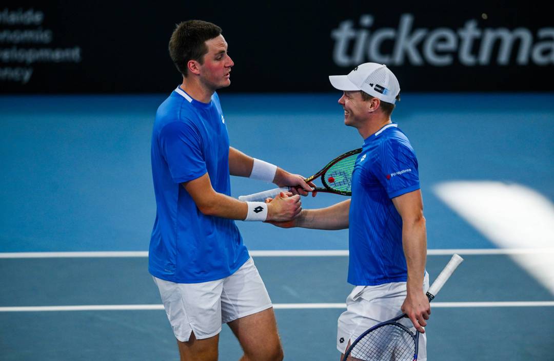 Henry Patten and Harri Heliovaara high five in the Adelaide International final