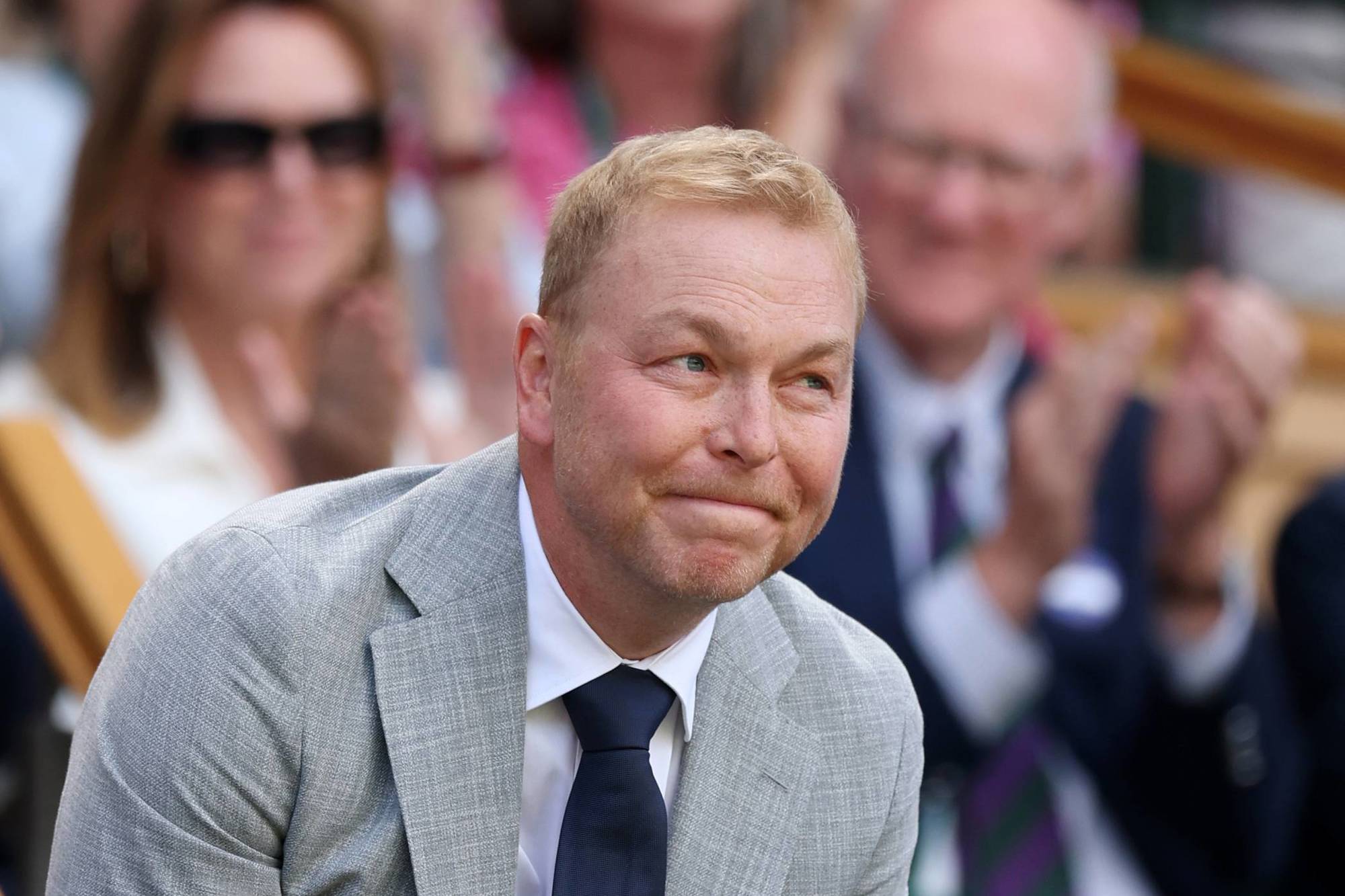 Former professional cyclist Sir Chris Hoy smiling in the Royal Box