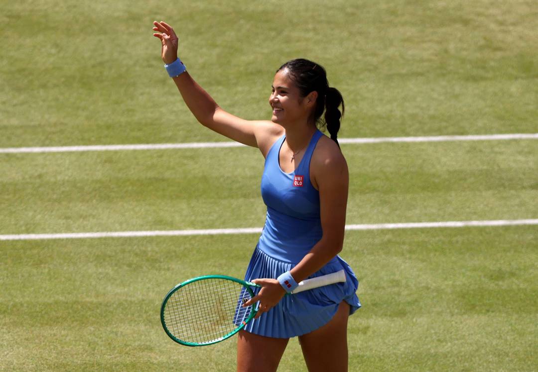 Emma Raducanu waves to the crowd after reaching the semi-finals at the HSBC Championships