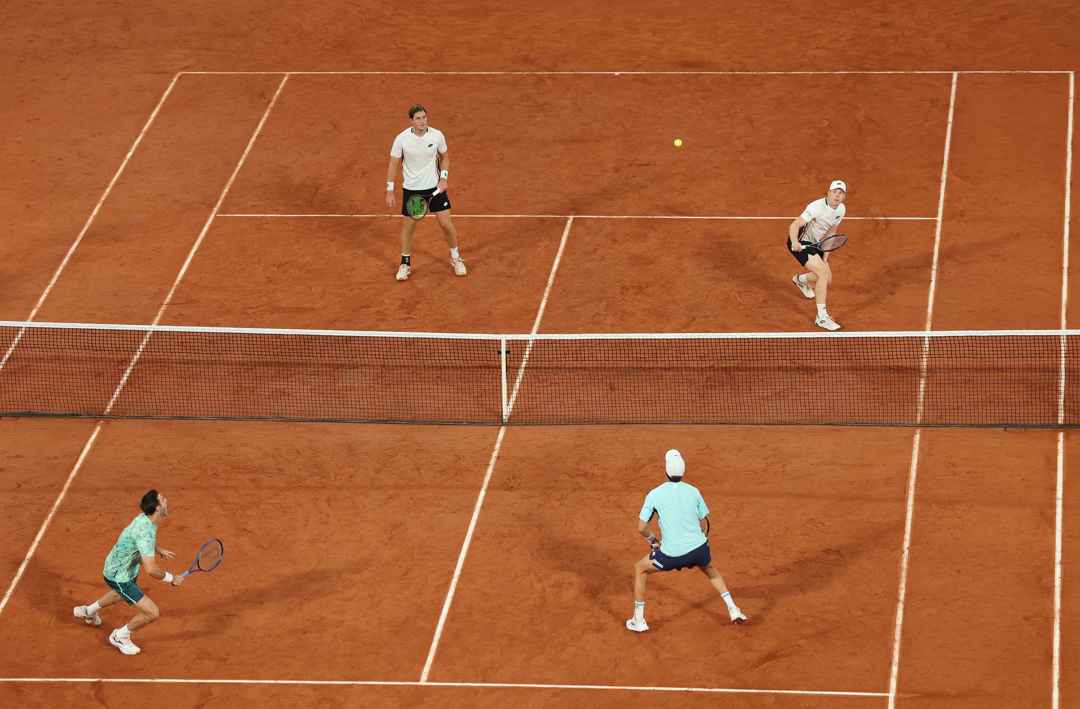 Henry Patten and Harri Heliovaara during a rally in the 2026 Roland Garros final