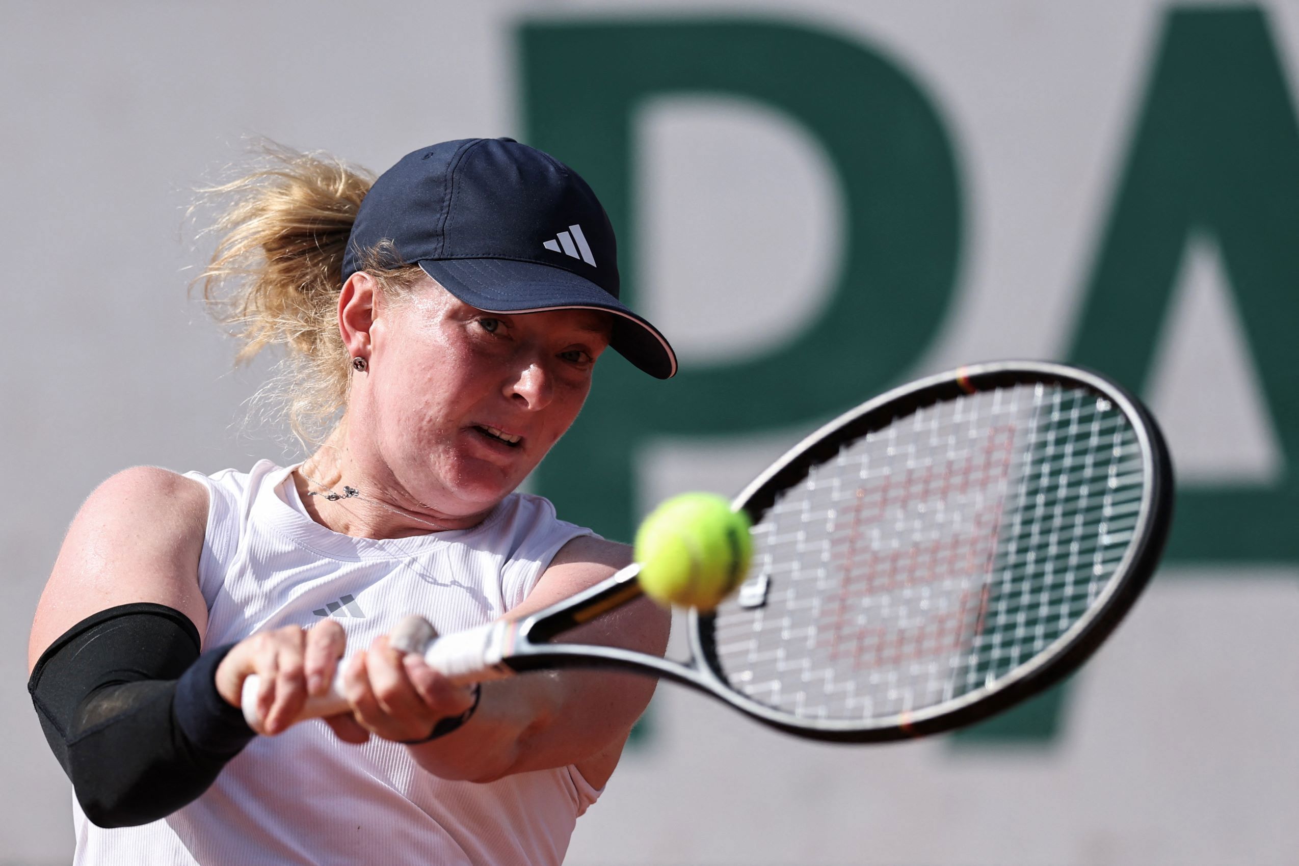 British tennis player, Francesca Jones hits a double handed backhand
