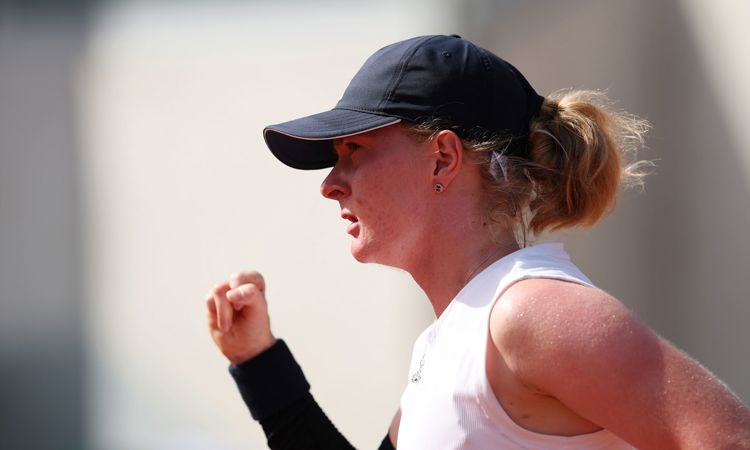 British tennis player Francesca Jones pumps her fist in celebration