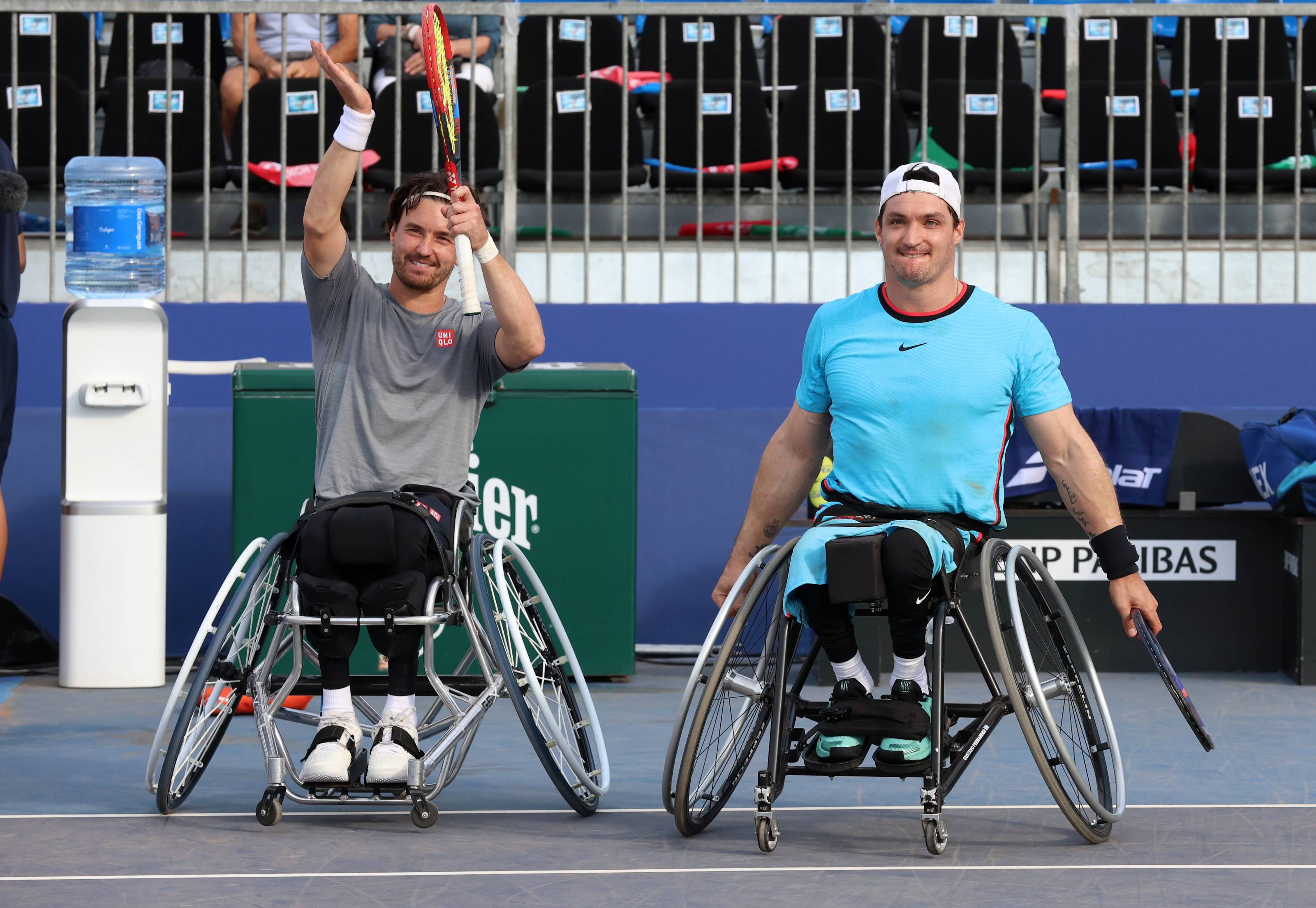 Gordon Reid and Gustavo Fernandez applaude the fans at the French Riviera Open