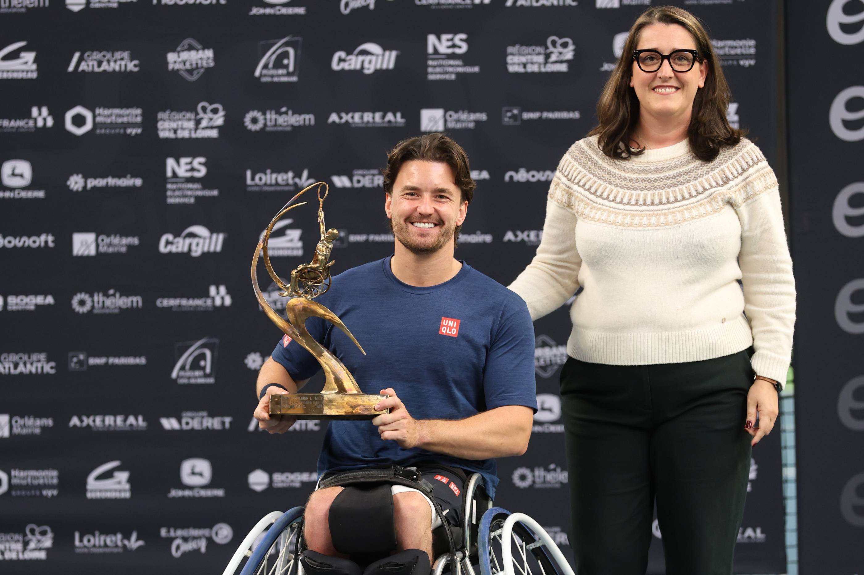 British wheelchair tennis star Gordon Reid holding the Open du Loiret singles title