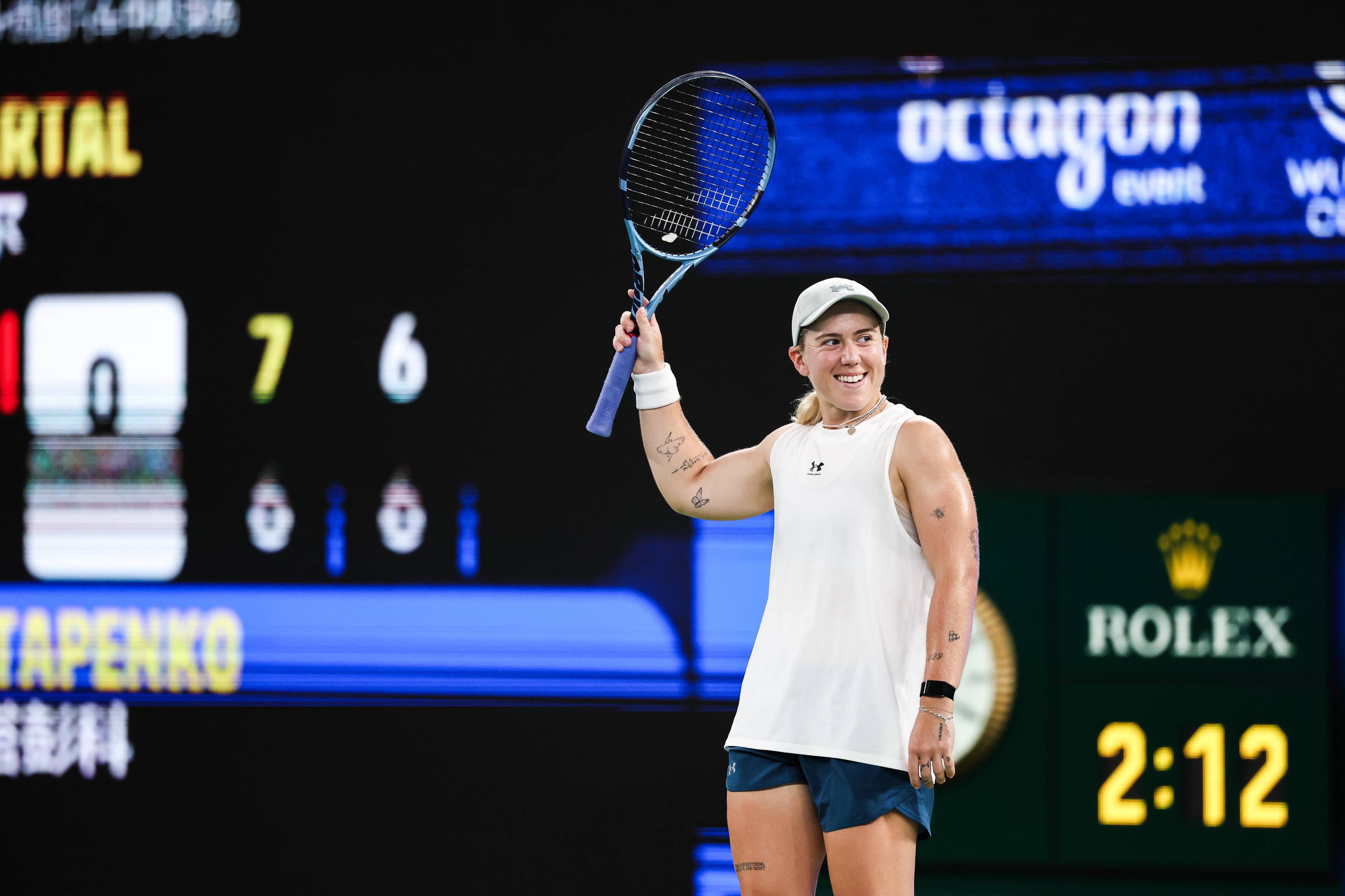 British tennis player Sonay Kartal waves at the crowd after winning the semi-final of the Wuhan Open