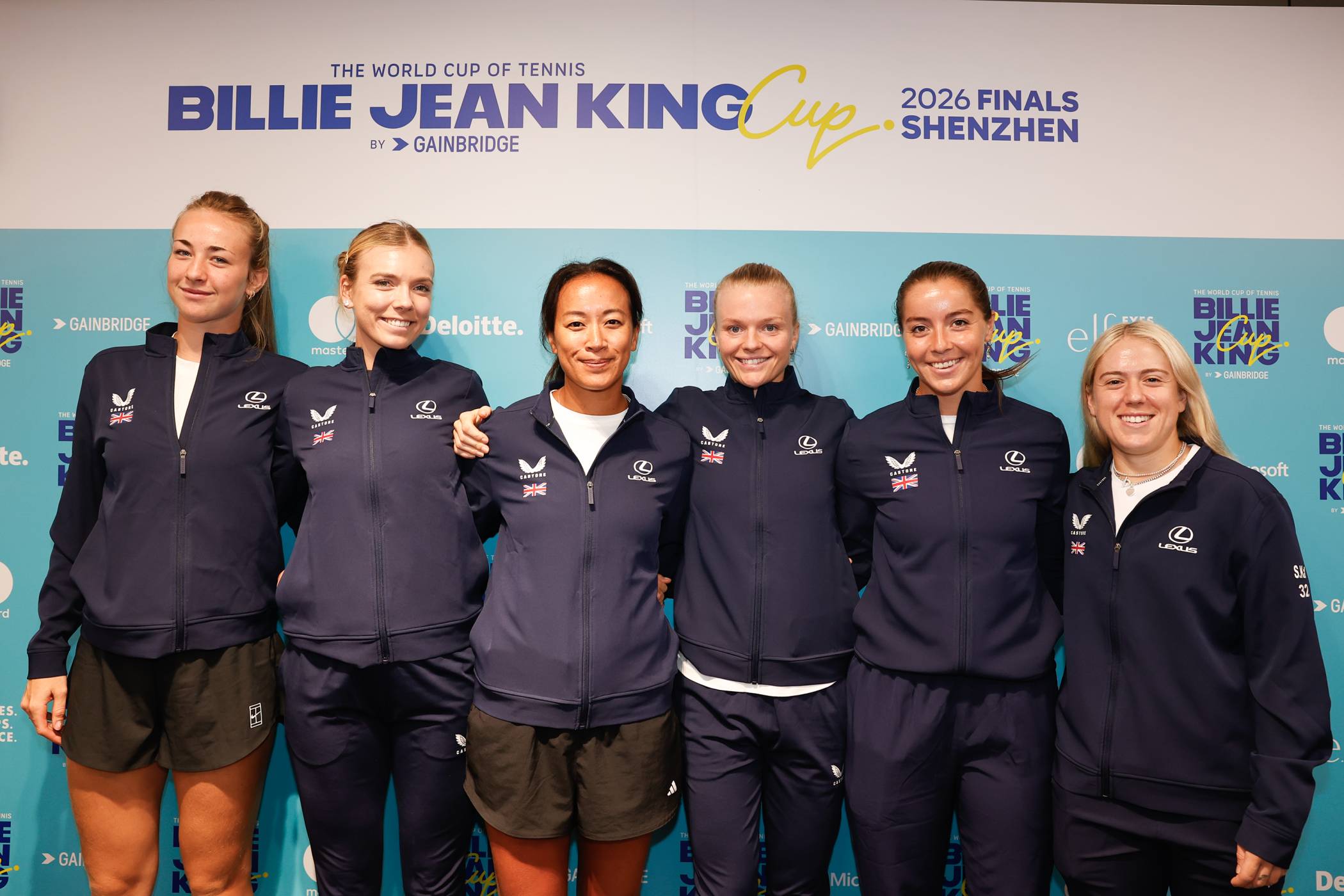 The Lexus Great Britain Billie Jean King Cup Finals 2026 team smiling in front of the press board
