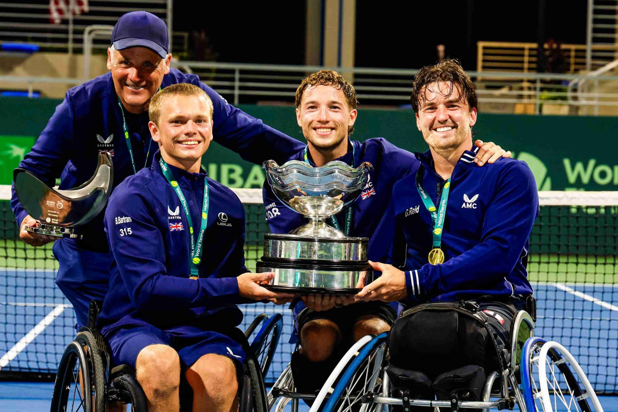 British wheelchair tennis players Ben Bartram, Alfie Hewett and Gordon Reid holding the 2026 World Team Cup title