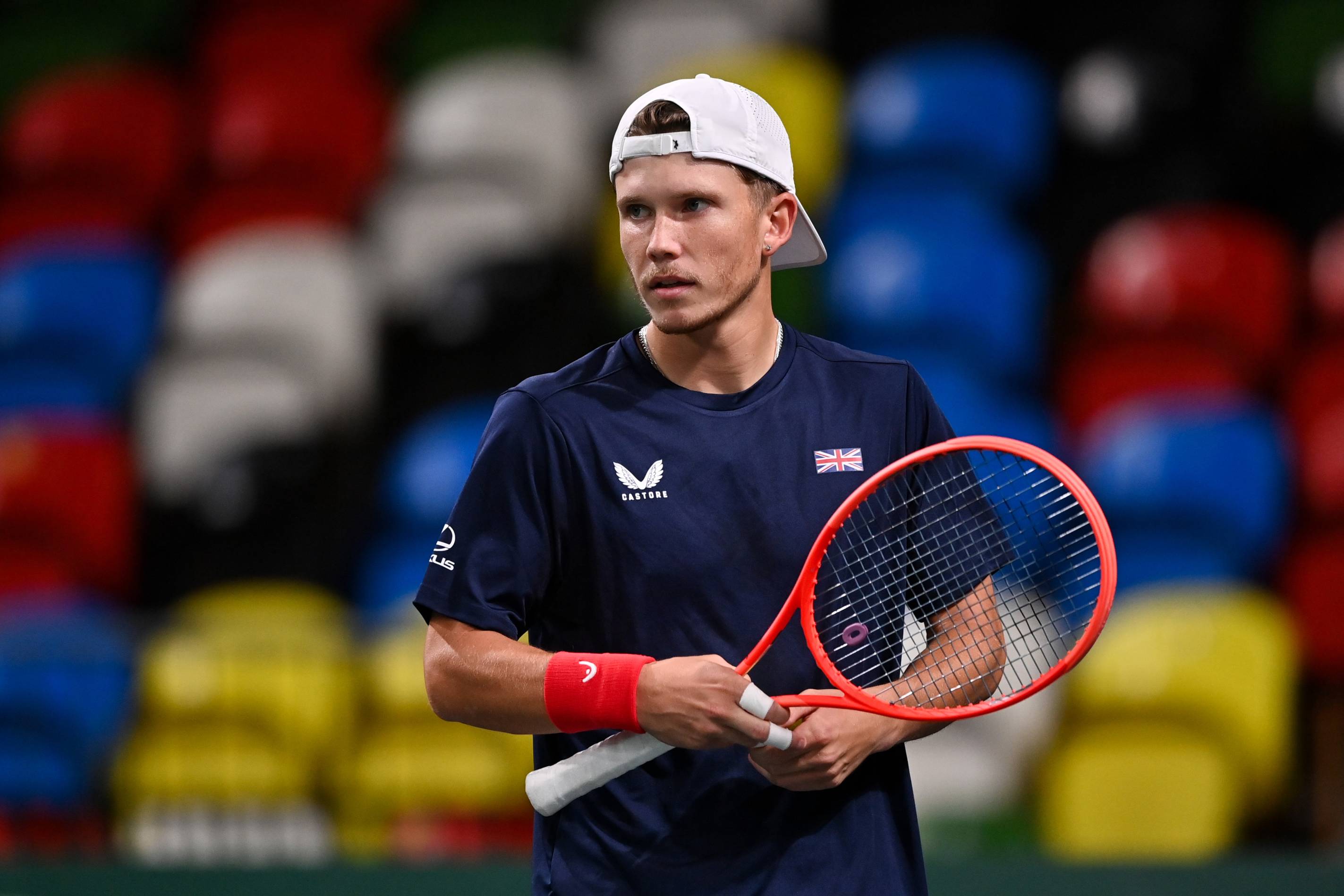 British tennis player Harry Wendelken holding his tennis racket in his hand while looking ahead during Davis Cup training 