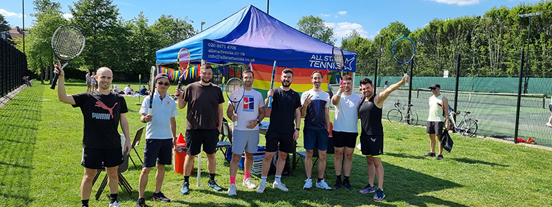 team of south london smashers standing in front of all stars tennis tent outside tennis courts